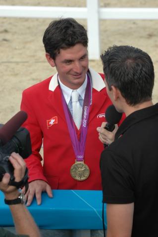 London2012_Show_Jumping_Individual_Final_Steve_Guerdat_medal.JPG