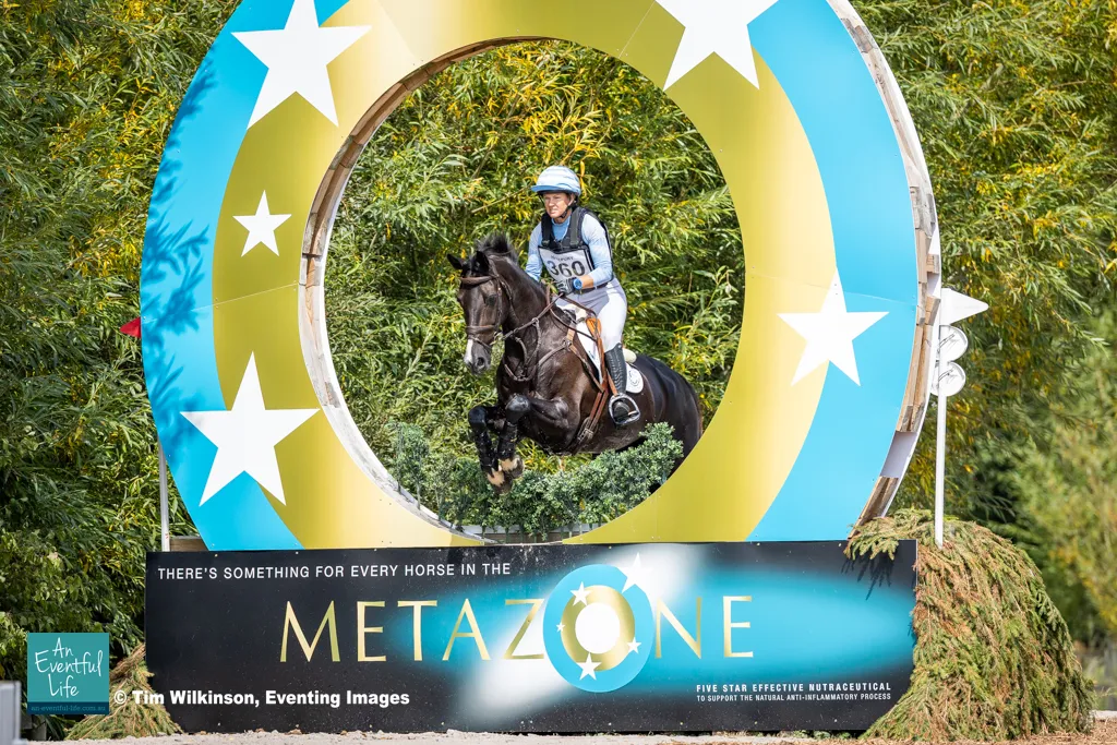 Jonelle Price rides Grappa Nera during cross country for the British Open Championship eventing at the 2025 NAF Five Star Hartpury International Horse Trials & British National Championships | An Eventful Life